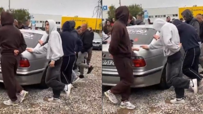 Właściciel komisu zrobił konkurs. Trzeba stać na jednej nodze i trzymać BMW które jest do wygrania